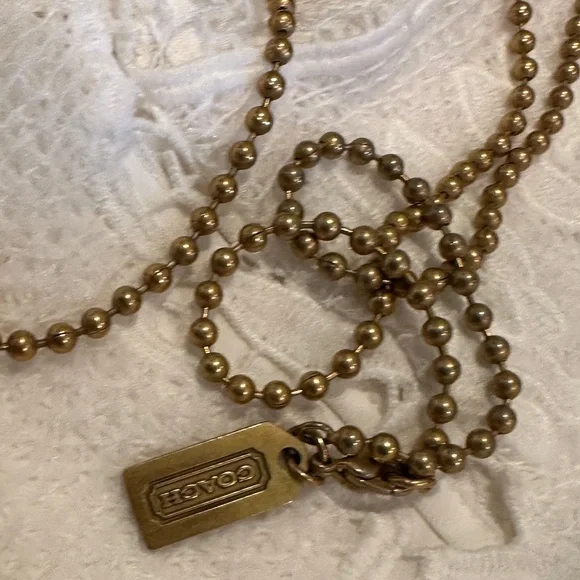 Coach Logo Pendant In Gold Tone with Amber Glass Center on Gold Tone Chain - Picture 12 of 16